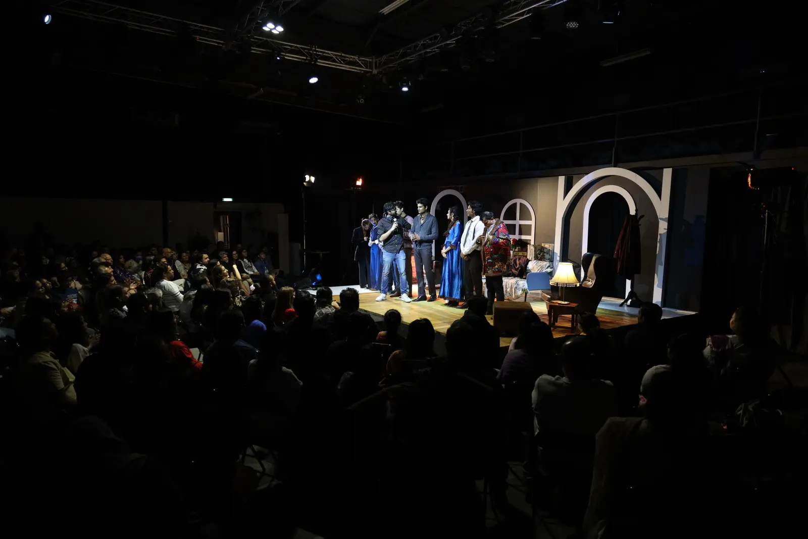 Actors performing The Mousetrap on stage