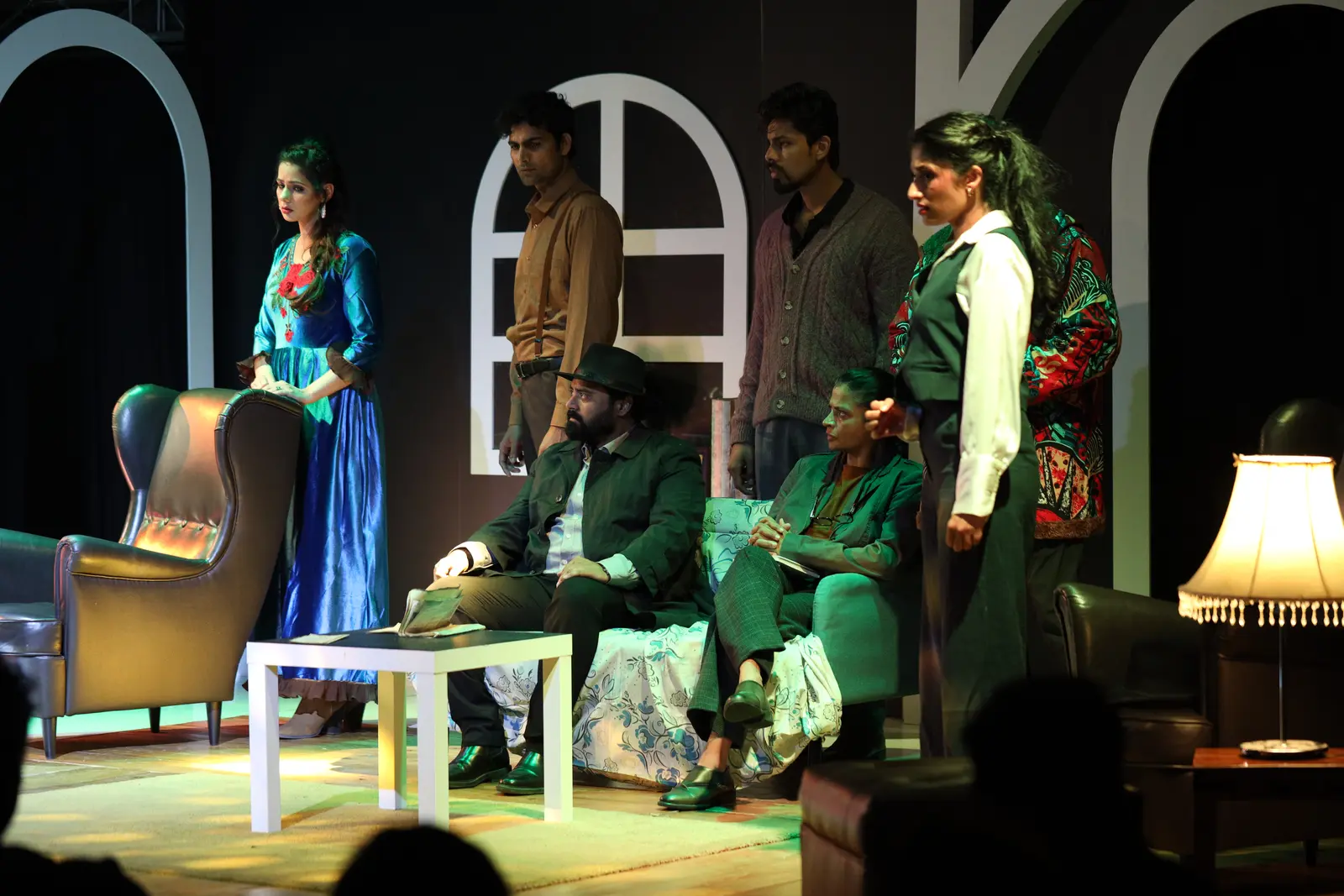 Actors performing on The Mousetrap set
